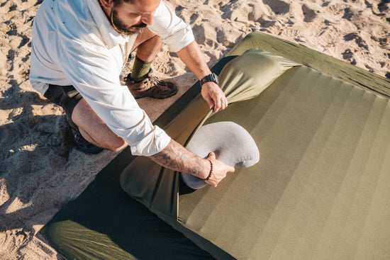 Lightweight backpacking mattress with pillow compartment