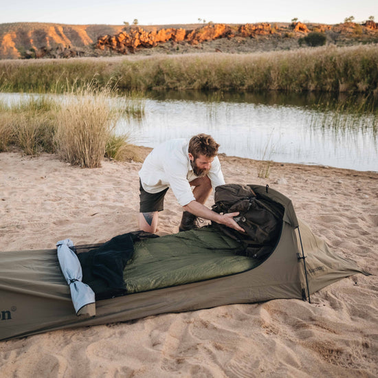 Setting up camp in Australian outback using Alton's equipment