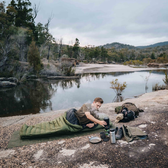 Camper using Alton Sleeping Bag